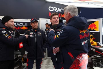 MILTON KEYNES, ENGLAND - DECEMBER 10: Max Verstappen of the Netherlands and Oracle Red Bull Racing (L3) with Sergio Perez of Mexico and Oracle Red Bull Racing (L2), during the Oracle Red Bull Racing Home Run event at Red Bull Racing Factory on December 10, 2022 in Milton Keynes, England. (Photo by Bryn Lennon/Getty Images for Oracle Red Bull Racing)