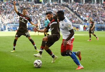 Soccer Football - 2. Bundesliga - Hamburger SV v St Pauli - Volksparkstadion, Hamburg, Germany - September 30, 2018  St Pauli's Enver Sahin in action with Hamburger SV's Orel Mangala 