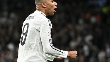 Real Madrid's French forward #09 Kylian Mbappe celebrates scoring his team's first goal during the Spanish Copa del Rey (King's Cup) last 16 first leg football match between Real Madrid CF and RC Celta de Vigo at the Santiago Bernabeu stadium in Madrid on January 16, 2025. (Photo by JAVIER SORIANO / AFP)