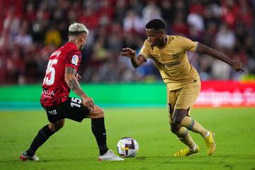 Pablo Maffeo y Ansu Fati.