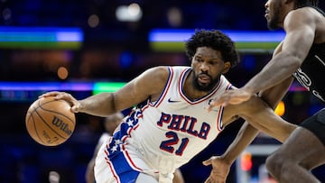 Philadelphia 76ers center Joel Embiid (21) controls the ball against Brooklyn Nets center Day'Ron Sharpe (20) during the third quarter at Wells Fargo Center.