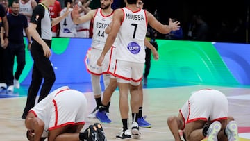 Players of Egypt kiss the floor after beating Mexico during the FIBA Basketball World Cup 2023 group stage match between Egypt and Mexico in Manila, Philippines.