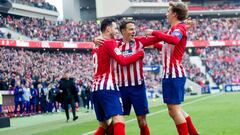 Niko Kalinic, Antoine Griezmann y Santiago Arias celebran un gol con el Atl&eacute;tico.