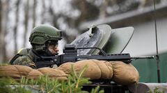 A soldier of a Marder infantry battalion practices on Marder tank as the Marder fighting vehicle company of the Armoured Infantry Brigade 37 takes part in NATO's high-readiness task force in Marienberg, Germany, January 12, 2023. REUTERS/Matthias Rietschel