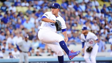 LOS ANGELES, CA - OCTOBER 19: Julio Urias #7 of the Los Angeles Dodgers delivers a pitch against the Chicago Cubs in the first inning of game four of the National League Championship Series at Dodger Stadium on October 19, 2016 in Los Angeles, California. (Photo by Harry How/Getty Images)