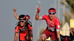 Norwegian Alexander Kristoff of team Katusha gestures as he crosses the finish line ahead of BMC&#039;s Belgium Greg Van Avermaet during the fourth stage of the 15th Tour of Qatar.