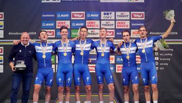Cycling - UCI Road Cycling World Championships - Tirol, Austria - September 23, 2018  Team Quick-Step Floors celebrate on the podium after winning the Men&#039;s Team Time Trial  REUTERS/Heinz-Peter Bader