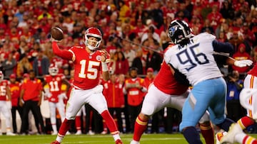 KANSAS CITY, MISSOURI - NOVEMBER 06: Patrick Mahomes #15 of the Kansas City Chiefs passes the ball against the Tennessee Titans in the first half at Arrowhead Stadium on November 06, 2022 in Kansas City, Missouri. Jason Hanna/Getty Images/AFP