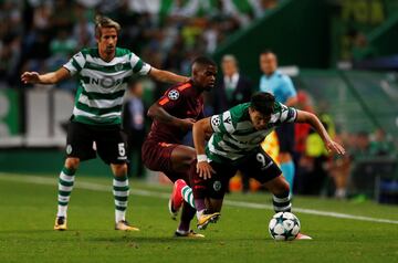 Marcos Acuña con Nelson Semedo.