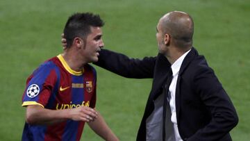 David Villa y Pep Guardiola.