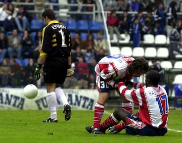 El 7 de mayo de 2000, el club consumó su descenso a la Segunda División tras empatar contra el Real Oviedo y sufrir ese año una intervención judicial. En la imagen Luque anima a su compañero Hasselbaink, momentos antes de que éste fallara un penalty, lo que impidió a los madrileños conseguir la victoria y supuso el descenso.
El Atlético logró retornar a Primera División el 28 de abril de 2002 con un equipo dirigido por Luis Aragonés. Este período se conoce como los años en el infierno, debido a una campaña de captación de socios lanzada por el club. El club finalizó la temporada como campeón de Segunda División.