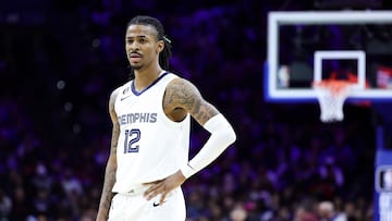 (FILES) In this file photo taken on February 22, 2023 Ja Morant #12 of the Memphis Grizzlies looks on during the third quarter against the Philadelphia 76ers at Wells Fargo Center in Philadelphia, Pennsylvania. - Memphis Grizzlies guard Ja Morant was suspended eight games without pay by the NBA on March 15, 2023 after streaming a video of himself holding a gun while intoxicated at a nightclub. (Photo by Tim Nwachukwu / GETTY IMAGES NORTH AMERICA / AFP)