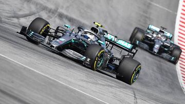 Mercedes&#039; Finnish driver Valtteri Bottas steers his car ahead of Mercedes&#039; British driver Lewis Hamilton during the Austrian Formula One Grand Prix in Spielberg on June 30, 2019. (Photo by JOE KLAMAR / AFP)