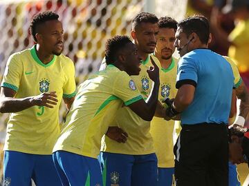 That yellow | Vinicius Jr argues with Referee Jesus Valenzuela after receiving a yellow card against Colombia.