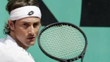 <B>A CASA</B>. El valenciano se despide del torneo que le hizo grande en tercera ronda.