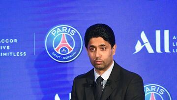Paris Saint-Germain's Qatari president Nasser Al-Khelaifi (R) gives a press conference with Chairman and CEO of French hotel operator AccorHotels to announce new shirt sponsorship deal with the French multinational Accor at the Parc des Princes stadi