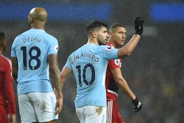 Manchester City's Argentinian striker Sergio Aguero celebrates after scoring their third goal during the English Premier League football match against Watford.