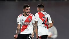 River Plate's midfielder Ezequiel Barco (R) celebrates with midfielder Santiago Simon (L) after scoring against Racing Club during their Argentine Professional Football League match at El Monumental stadium in Buenos Aires, on February 27, 2022. (Photo by ALEJANDRO PAGNI / AFP)