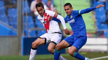 GETAFE, SPAIN - FEBRUARY 12: Angel Algobia of Getafe CF battle for the ball with Oscar Trejo of Rayo Vallecano during the LaLiga Santander match between Getafe CF and Rayo Vallecano at Coliseum Alfonso Perez on February 12, 2023 in Getafe, Spain. (Photo by Diego Souto/Quality Sport Images/Getty Images)