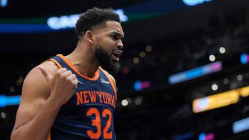 WASHINGTON, DC - DECEMBER 30: Karl-Anthony Towns #32 of the New York Knicks reacts after scoring against the Washington Wizards during the second half at Capital One Arena on December 30, 2024 in Washington, DC. NOTE TO USER: User expressly acknowledges and agrees that, by downloading and or using this photograph, User is consenting to the terms and conditions of the Getty Images License Agreement. Jess Rapfogel/Getty Images/AFP (Photo by Jess Rapfogel / GETTY IMAGES NORTH AMERICA / Getty Images via AFP)
