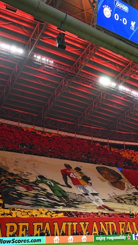 Liverpool supporters display a giant tifo in honour of Galatasaray's Nigerian forward #45 Victor Osimhen and his late mother during the UEFA Champions League round of 16 first leg football match between Galatasaray SK and Liverpool FC at the Ali Sami Yen Sports Complex in Istanbul on March 10, 2026. (Photo by YASIN AKGUL / AFP)