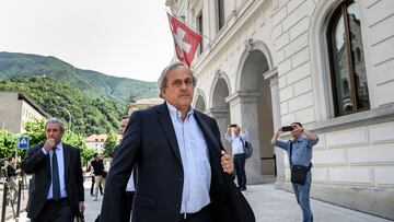 Former UEFA president Michel Platini leaves Switzerland's Federal Criminal Court after the first day of his trial over a suspected fraudulent payment, in the southern Switzerland city of Bellinzona, on June 8, 2022. - Sepp Blatter and Michel Platini, once the chiefs of world and European football start a two-week trial following a mammoth investigation that began in 2015 and lasted six years. (Photo by Fabrice COFFRINI / AFP)