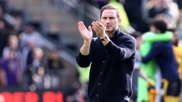 Chelsea's English caretaker manager Frank Lampard applauds fans on the pitch after the English Premier League football match between Wolverhampton Wanderers and Chelsea at the Molineux stadium in Wolverhampton, central England on April 8, 2023. - Wolves won the game 1-0. (Photo by Darren Staples / AFP) / RESTRICTED TO EDITORIAL USE. No use with unauthorized audio, video, data, fixture lists, club/league logos or 'live' services. Online in-match use limited to 120 images. An additional 40 images may be used in extra time. No video emulation. Social media in-match use limited to 120 images. An additional 40 images may be used in extra time. No use in betting publications, games or single club/league/player publications. / 