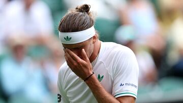 Tennis - Wimbledon - All England Lawn Tennis and Croquet Club, London, Britain - July 1, 2025 Germany's Alexander Zverev reacts during his first round match against France's Arthur Rinderknech REUTERS/Toby Melville