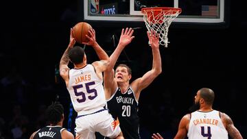 Oct 31, 2017; Brooklyn, NY, USA; Phoenix Suns guard Mike James (55) shoots over Brooklyn Nets center Timofey Mozgov (20) during the first half at Barclays Center. Mandatory Credit: Andy Marlin-USA TODAY Sports