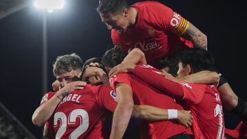 MALLORCA, SPAIN - FEBRUARY 14: Angel Rodriguez of RCD Mallorca celebrates scoring his team's second goal with teammates during the LaLiga Santander match between RCD Mallorca and Athletic Club at Estadio de Son Moix on February 14, 2022 in Mallorca,