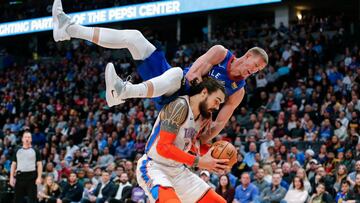 Dec 14, 2018; Denver, CO, USA; Denver Nuggets forward Mason Plumlee (24) falls over the back of Oklahoma City Thunder center Steven Adams (12) in the fourth quarter at the Pepsi Center. Mandatory Credit: Isaiah J. Downing-USA TODAY Sports