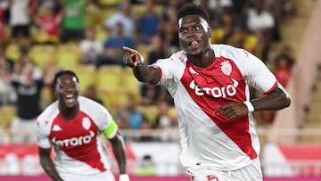 (FILES) In this file photo taken on September 11, 2022 Monaco's French defender Benoit Badiashile (R) celebrates scoring his team's first goal during the French L1 football match between AS Monaco and Olympique Lyonnais at the Louis II Stadium (Stade Louis II) in the Principality of Monaco. - Chelsea signed France international defender Benoit Badiashile from Ligue 1 side Monaco on Thursday, January 5, for a fee believed to be just under 40 million euros ($42 million). (Photo by CHRISTOPHE SIMON / AFP)