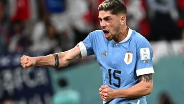 Uruguay's midfielder #15 Federico Valverde reacts during the Qatar 2022 World Cup Group H football match between Uruguay and South Korea at the Education City Stadium in Al-Rayyan, west of Doha on November 24, 2022. (Photo by Anne-Christine POUJOULAT / AFP)