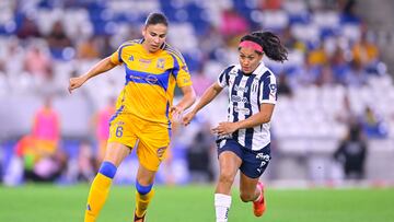 Jimena Lopez (L) of Tigres fights for the ball with Diana Evangelista (R) of Monterrey during the first leg of the Campeon de Campeonas Liga BBVA MX Femenil match between Tigres UANL and Monterrey at BBVA Bancomer Stadium, on June 27, 2024 in Monterrey Nuevo Leon, Mexico.