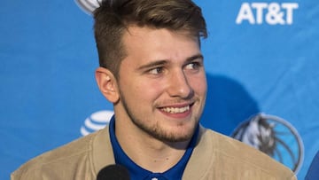 Jun 22, 2018; Dallas, TX, USA; Dallas Mavericks head coach Rick Carlisle (right) answers questions as Mavericks first round pick Luka Doncic, guard Slovenia (left) looks on during a press conference at the American Airlines Center. Mandatory Credit: Jerome Miron-USA TODAY Sports