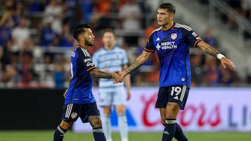 Jul 23, 2023; Cincinnati, OH, USA; FC Cincinnati forward Brandon Vazquez (19) high fives midfielder Luciano Acosta (10) after scoring a goal against Sporting Kansas City in the second half at TQL Stadium. Mandatory Credit: Katie Stratman-USA TODAY Sports