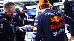 SUZUKA, JAPAN - OCTOBER 09: Adrian Newey, the Chief Technical Officer of Red Bull Racing delivers hot drinks to Red Bull Racing Team Principal Christian Horner, Max Verstappen of the Netherlands and Oracle Red Bull Racing and Red Bull Racing Team Consultant Dr Helmut Marko during a red flag delay during the F1 Grand Prix of Japan at Suzuka International Racing Course on October 09, 2022 in Suzuka, Japan. (Photo by Dan Istitene/Getty Images)