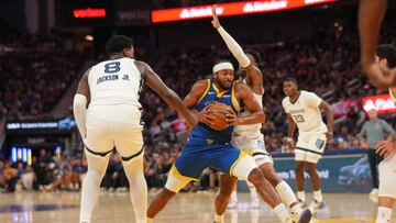 The Golden State Warriors beat the Memphis Grizzlies in a tense game.