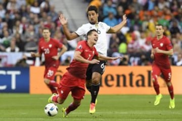 Sami Khedira y Arkadiusz Milik.