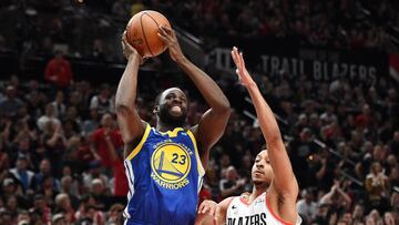 PORTLAND, OREGON - MAY 18: Draymond Green #23 of the Golden State Warriors shoots the ball against CJ McCollum #3 of the Portland Trail Blazers in game three of the NBA Western Conference Finals at Moda Center on May 18, 2019 in Portland, Oregon. NOTE TO USER: User expressly acknowledges and agrees that, by downloading and or using this photograph, User is consenting to the terms and conditions of the Getty Images License Agreement. Steve Dykes/Getty Images/AFP
== FOR NEWSPAPERS, INTERNET, TELCOS & TELEVISION USE ONLY ==