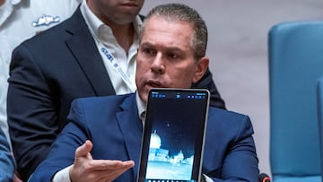 Israel's Ambassador to the United Nations Gilad Erdan shows a video of the missile attacks as he speaks to members of the Security Council during a meeting on the situation in the Middle East at U.N. headquarters in New York City, New York, U.S., April 14, 2024. REUTERS/Eduardo Munoz     TPX IMAGES OF THE DAY