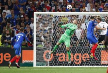 Neuer flaps at Paul Pogba's cross as Griezmann prepares to snap up the loose ball.