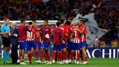 Atletico Madrid players celebrate their win at the end of the Spanish Liga football match between Club Atletico de Madrid and Real Madrid CF at the Metropolitano stadium in Madrid on September 24, 2023. (Photo by OSCAR DEL POZO / AFP)