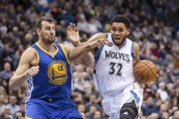 Karl-Anthony Towns y Andrew Bogut.