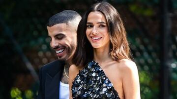 Rauw Alejandro and Bruna Markezine in a Carolina Herrera photoshoot in New York / Getty Images