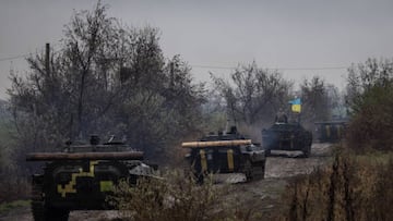 KHERSON, UKRAINE - NOVEMBER 20: A column of Ukrainian BMP-2 vehicles navigate a muddy road in Kherson region on November 20, 2022 in Kherson, Ukraine. Ukrainian forces took control of Kherson last week, as well as swaths of its surrounding region, after Russia pulled its forces back to the other side of the Dnipro river. Kherson was the only regional capital to be captured by Russia following its invasion on February 24. (Photo by Chris McGrath/Getty Images)