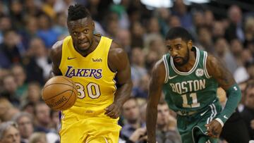 Julius Randle ante Kyrie Irving durante el Boston Celtics-Los Angeles Lakers.