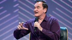 18 May 2022, Hamburg: Director Quentin Tarantino gestures during his appearance. The OMR digital festival in Hamburg focuses on a combination of trade fair, workshops and party. Photo: Jonas Walzberg/dpa (Photo by Jonas Walzberg/picture alliance via Getty Images)