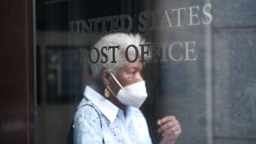 A woman walks into a Brooklyn Post Office in New York City. The United States Postal Service (USPS), the nation’s national mail carrier service, is under increased scrutiny from politicians who are warning that the agency is not prepared to handle t