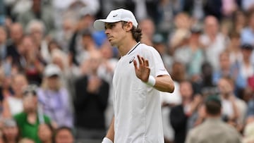 Australia's Alex De Minaur reacts after winning against France's Arthur Fils during their men's singles fourth round tennis match on the eighth day of the 2024 Wimbledon Championships at The All England Lawn Tennis and Croquet Club in Wimbledon, southwest London, on July 8, 2024. De Minaur won the match 6-2, 6-4, 4-6, 6-3. (Photo by Glyn KIRK / AFP) / RESTRICTED TO EDITORIAL USE